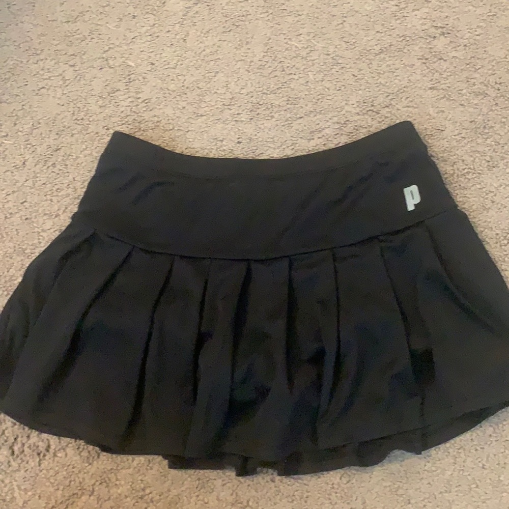 Black Prince pleated tennis skirt.